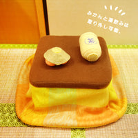 A cat that looks like a kotatsu